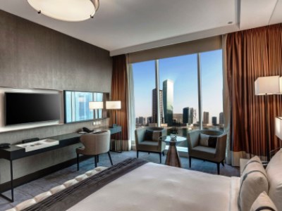 deluxe room - hotel pullman dubai downtown - dubai, united arab emirates