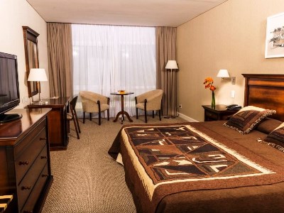 bedroom 1 - hotel howard johnson htl and convention center - merlo, argentina