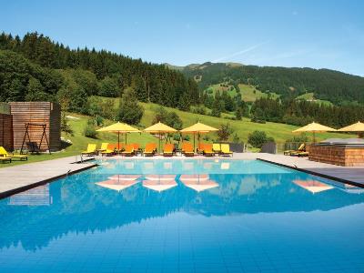 outdoor pool - hotel kempinski das tirol - jochberg, austria