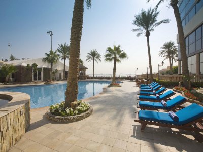outdoor pool - hotel elite resort and spa - manama, bahrain