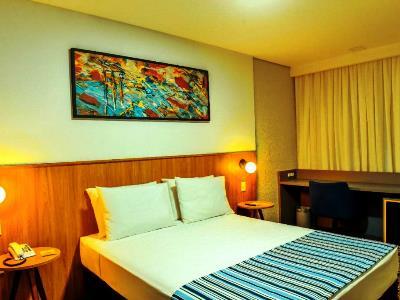 bedroom - hotel days inn by wyndham cascavel - cascavel, brazil