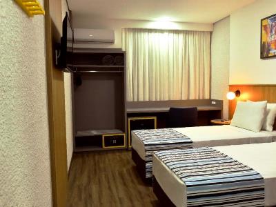 bedroom 2 - hotel days inn by wyndham cascavel - cascavel, brazil