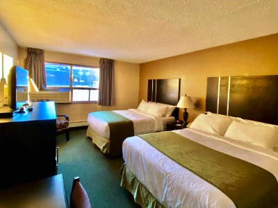 bedroom 1 - hotel ramada by wyndham whitecourt - whitecourt, canada