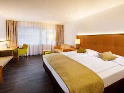 bedroom 1 - hotel ramada by wyndham baden hotel du parc - baden, switzerland