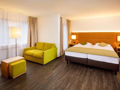 bedroom 2 - hotel ramada by wyndham baden hotel du parc - baden, switzerland