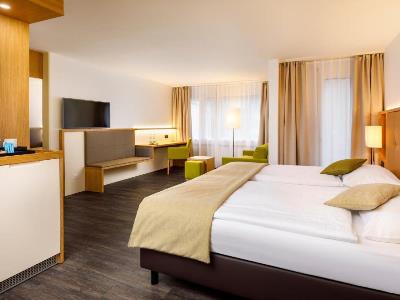 bedroom 3 - hotel ramada by wyndham baden hotel du parc - baden, switzerland