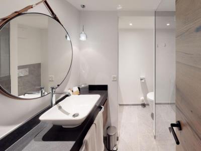 bathroom - hotel walliserhof grand hotel and spa - saas fee, switzerland