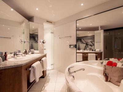 bathroom 1 - hotel walliserhof grand hotel and spa - saas fee, switzerland