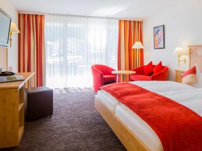 bedroom 2 - hotel modern rooms by taescherhof - tasch, switzerland