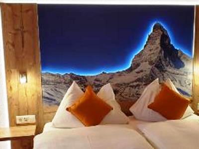 bedroom - hotel typically swiss hotel tascherhof(driver) - tasch, switzerland