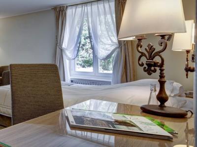bedroom - hotel les sources des alpes - leukerbad, switzerland