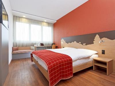 bedroom - hotel swissever hotel zug - cham, switzerland