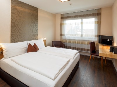 bedroom 1 - hotel villmergen swiss quality - villmergen, switzerland