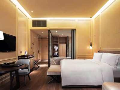 bedroom 2 - hotel hilton dalian golden pebble beach resort - dalian, china