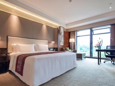 bedroom 2 - hotel howard johnson jinyi chongqing - chongqing, china
