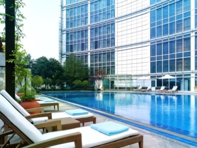 outdoor pool - hotel new world wuhan - wuhan, china