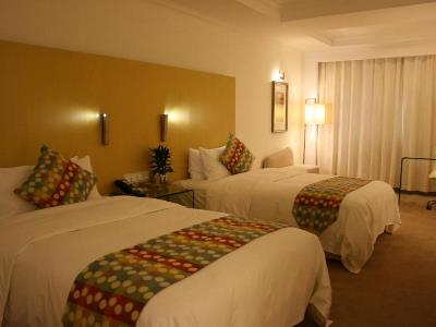 bedroom - hotel grand mercure urumqi hualing - urumqi, china