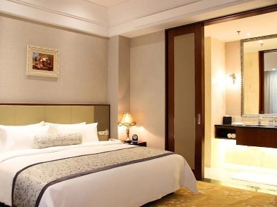 bedroom 1 - hotel gloria plaza qingdao - qingdao, china