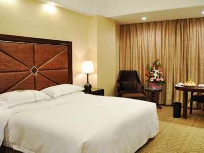 bedroom - hotel grand regency - qingdao, china