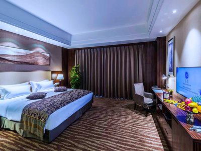 bedroom - hotel grand mercure qingdao airlines - qingdao, china