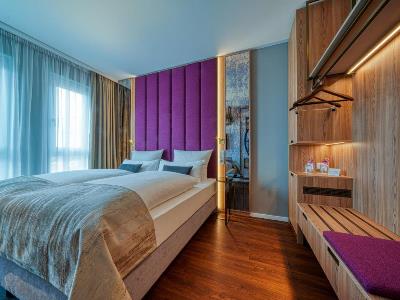 bedroom 1 - hotel fourside hotel ringsheim - ringsheim, germany