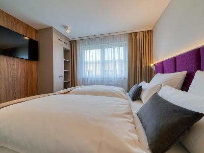 bedroom 8 - hotel fourside hotel ringsheim - ringsheim, germany