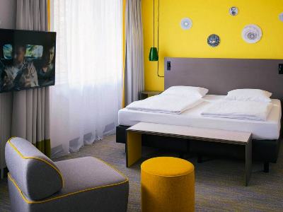 bedroom 1 - hotel vienna house easy by wyndham oeynhausen - bad oeynhausen, germany