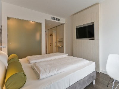 bedroom 1 - hotel super 8 by wyndham freiburg - freiburg im breisgau, germany