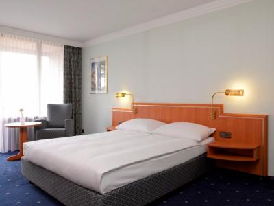 bedroom - hotel leonardo hannover airport - hanover, germany
