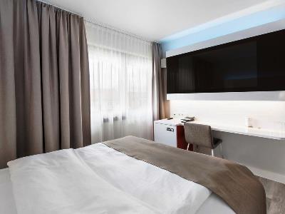 bedroom - hotel dormero hannover - hanover, germany