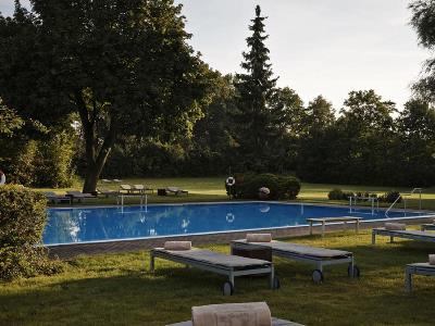 outdoor pool - hotel kempinski hotel frankfurt gravenbruch - neu-isenburg, germany
