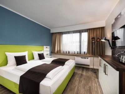 bedroom 2 - hotel ibis styles offenburg city - offenburg, germany