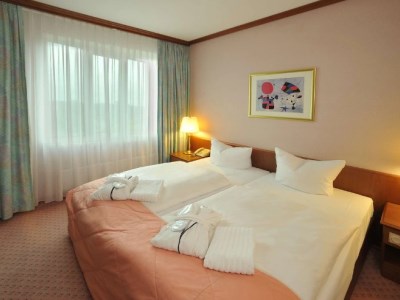 bedroom 2 - hotel radisson blu cottbus - cottbus, germany