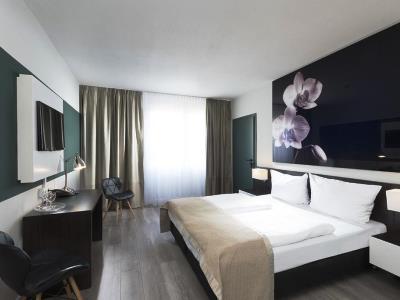 bedroom - hotel days inn dessau - dessau, germany