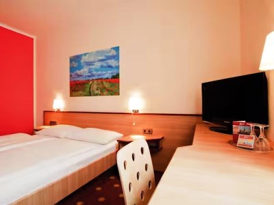 bedroom - hotel vienna house easy by wyndham rostock - rostock, germany