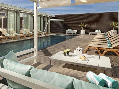 outdoor pool - hotel melia barcelona sky - barcelona, spain