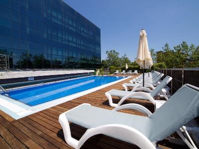 outdoor pool - hotel abba playa gijon - gijon, spain