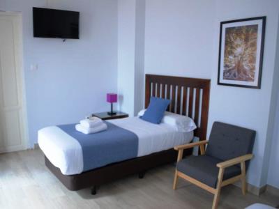 bedroom 3 - hotel la perla granada suites - granada, spain