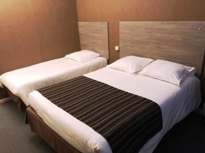 bedroom 1 - hotel adonis lyon est artys - saint priest, france