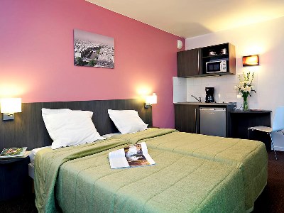 bedroom 2 - hotel aparthotel adagio access paris asnieres - asnieres sur seine, france