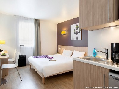 bedroom 4 - hotel aparthotel adagio access paris asnieres - asnieres sur seine, france
