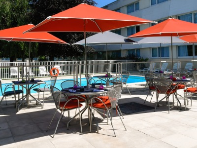 outdoor pool - hotel novotel caen cote de nacre - caen, france