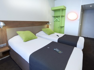 bedroom - hotel campanile lyon gare perrache confluence - lyon, france