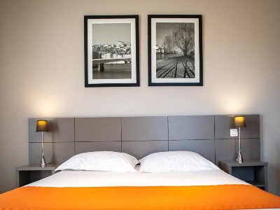 bedroom - hotel adonis lyon dock ouest - lyon, france