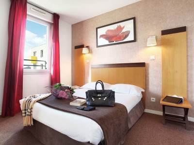 bedroom - hotel appart'hotel odalys bioparc - lyon, france