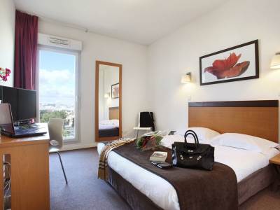 bedroom 1 - hotel appart'hotel odalys bioparc - lyon, france