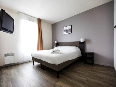 bedroom - hotel aparthotel adagio access orleans - orleans, france