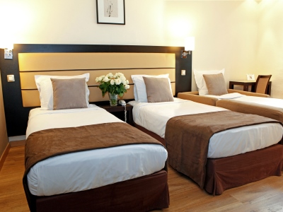 bedroom 6 - hotel sure by bw paris gare du nord - paris, france