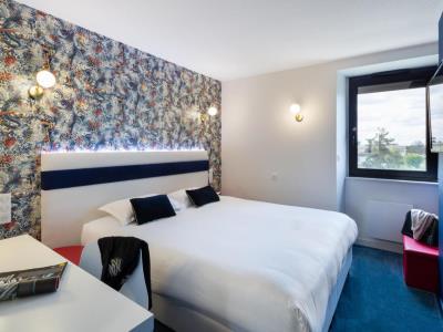 bedroom - hotel l'ortega - rennes, france