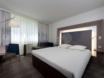 bedroom - hotel novotel evry courcouronnes - evry, france